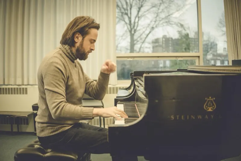 Pianist Daniil Trifonov at a Steinway grand piano